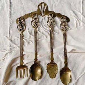 SOLD Vintage brass serving utensils with wall hook